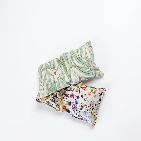 White Floral and Gum Leaves heat pack folded to show both patterns